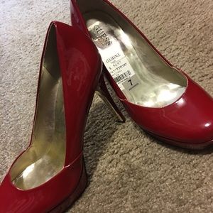 Guess red heels with gold accent